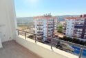 KIZKALESİ MERKEZDE DENİZE MANZARALI VE HAVUZLU SATILIK 1+1 DAİRE
