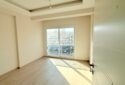 KIZKALESİ MERKEZDE DENİZE MANZARALI VE HAVUZLU SATILIK 1+1 DAİRE