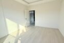 KIZKALESİ MERKEZDE DENİZE MANZARALI VE HAVUZLU SATILIK 1+1 DAİRE