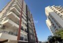 KIZKALESİ MERKEZDE DENİZE MANZARALI VE HAVUZLU SATILIK 1+1 DAİRE