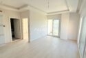 KIZKALESİ MERKEZDE DENİZE MANZARALI VE HAVUZLU SATILIK 1+1 DAİRE