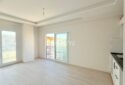 KIZKALESİ MERKEZDE DENİZE MANZARALI VE HAVUZLU SATILIK 1+1 DAİRE