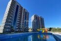 ERDEMLİ LİMONLU AY YAPI PALMİYE KONUTLARINDA EŞYALI 2+1 SATILIK DAİRE