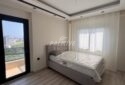 ERDEMLİ LİMONLU AY YAPI PALMİYE KONUTLARINDA EŞYALI 2+1 SATILIK DAİRE