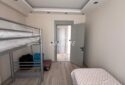 ERDEMLİ LİMONLU AY YAPI PALMİYE KONUTLARINDA EŞYALI 2+1 SATILIK DAİRE