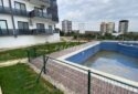 Ayaş’ta Havuzlu Site İçerisinde Deniz Manzaralı Eşyalı Satılık 1+1 Daire
